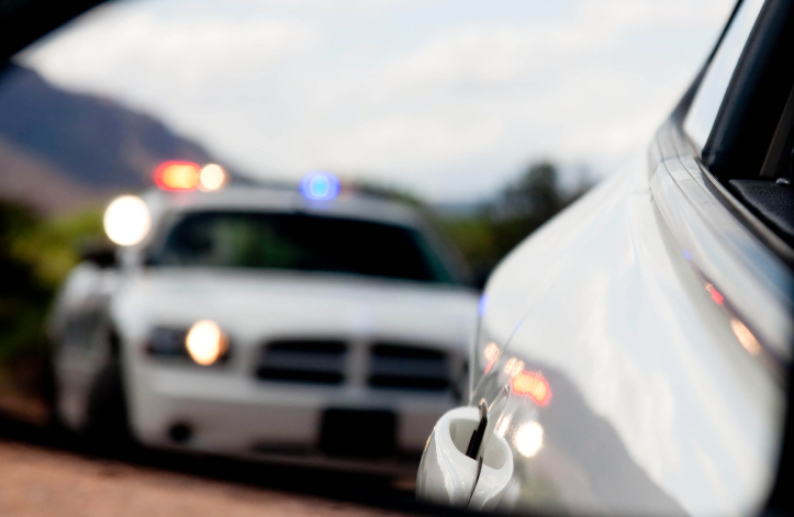 police car pulling over another car