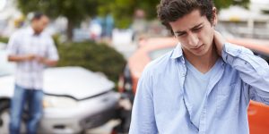 car accident injury man walking away from car accident - injured in Missouri