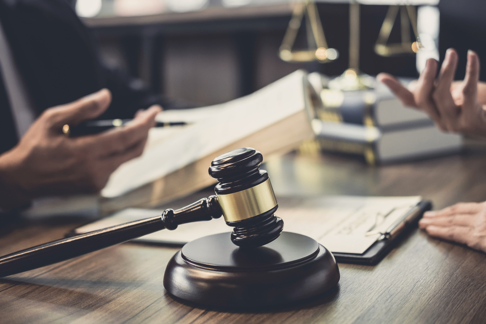 Businesswoman and Male lawyer or judge consult having team meeti
