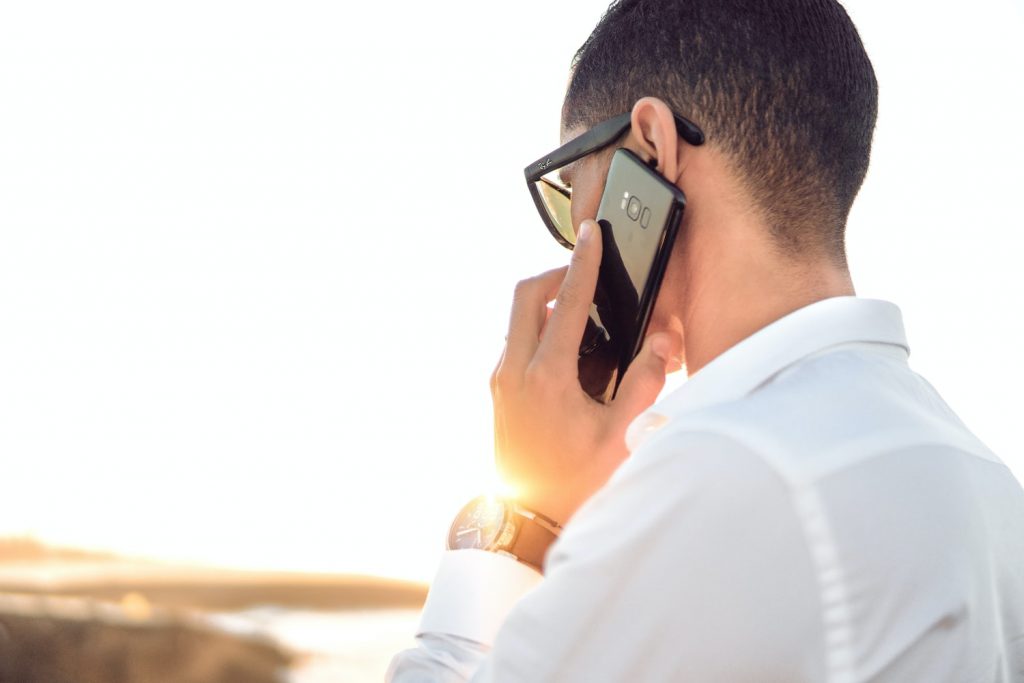 man holding smartphone